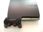 PS3 Slim Quasi Neuf + 2 Manette & 20 Jeux installé